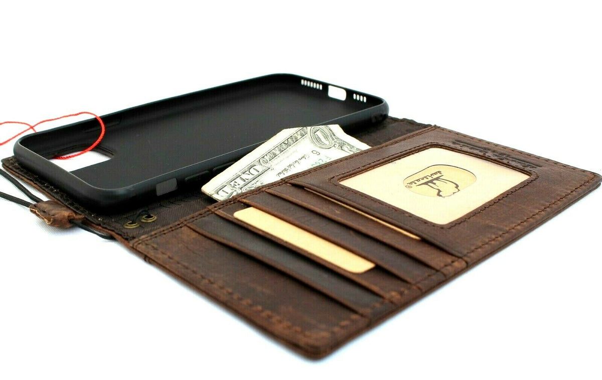 Handmade genuine vintage leather wallet case for Apple iPhone 11 Pro Max, with credit card slots and wireless charging capability.