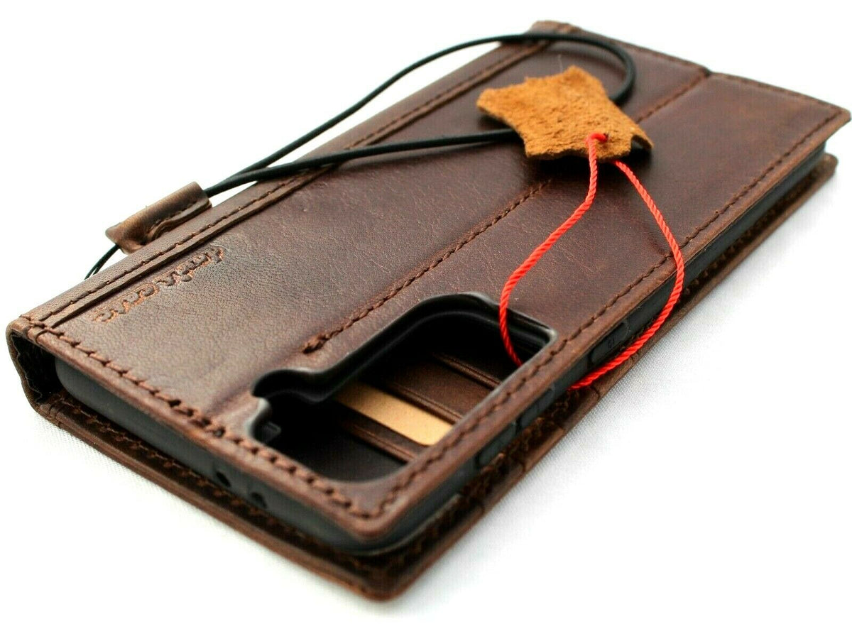 Dark vintage leather Galaxy S22 Plus wallet case by DAVISCASE with ID window, card slots, and wireless charging compatibility.