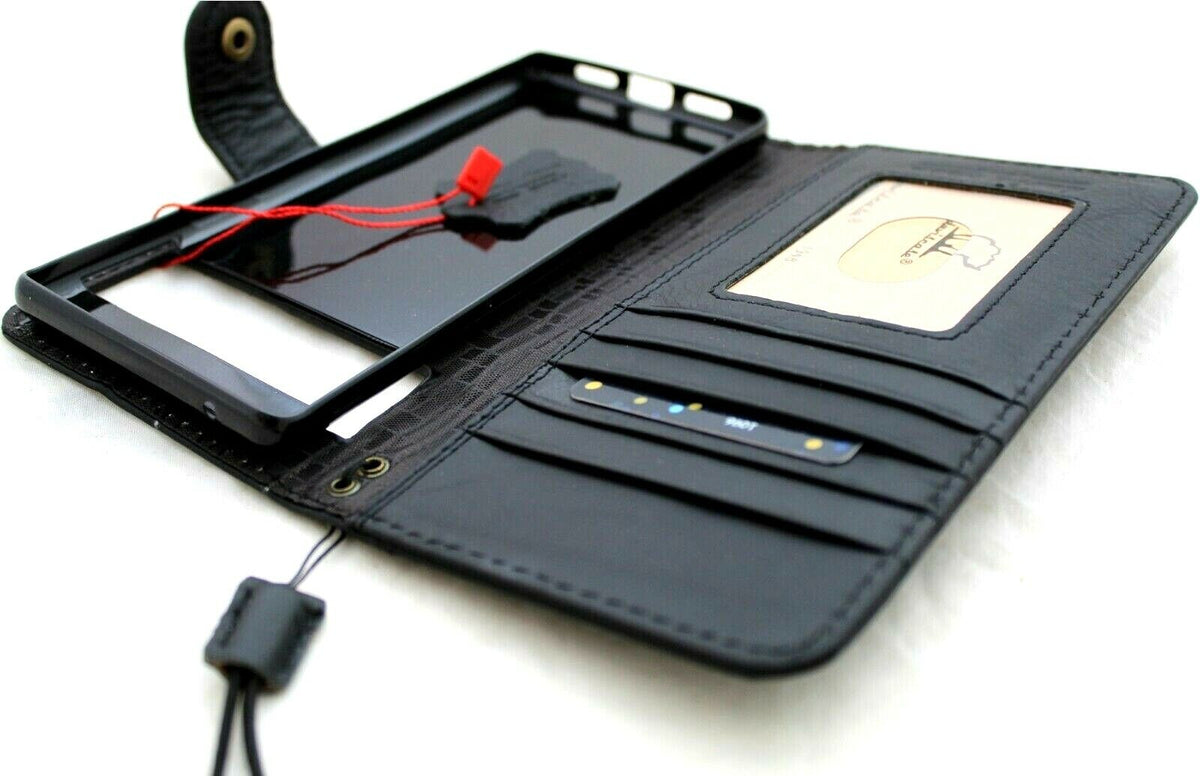 Genuine leather Google Pixel 7 Pro case by DAVISCASE with wallet design, book closure, stand feature, black color, compatible with wireless charging