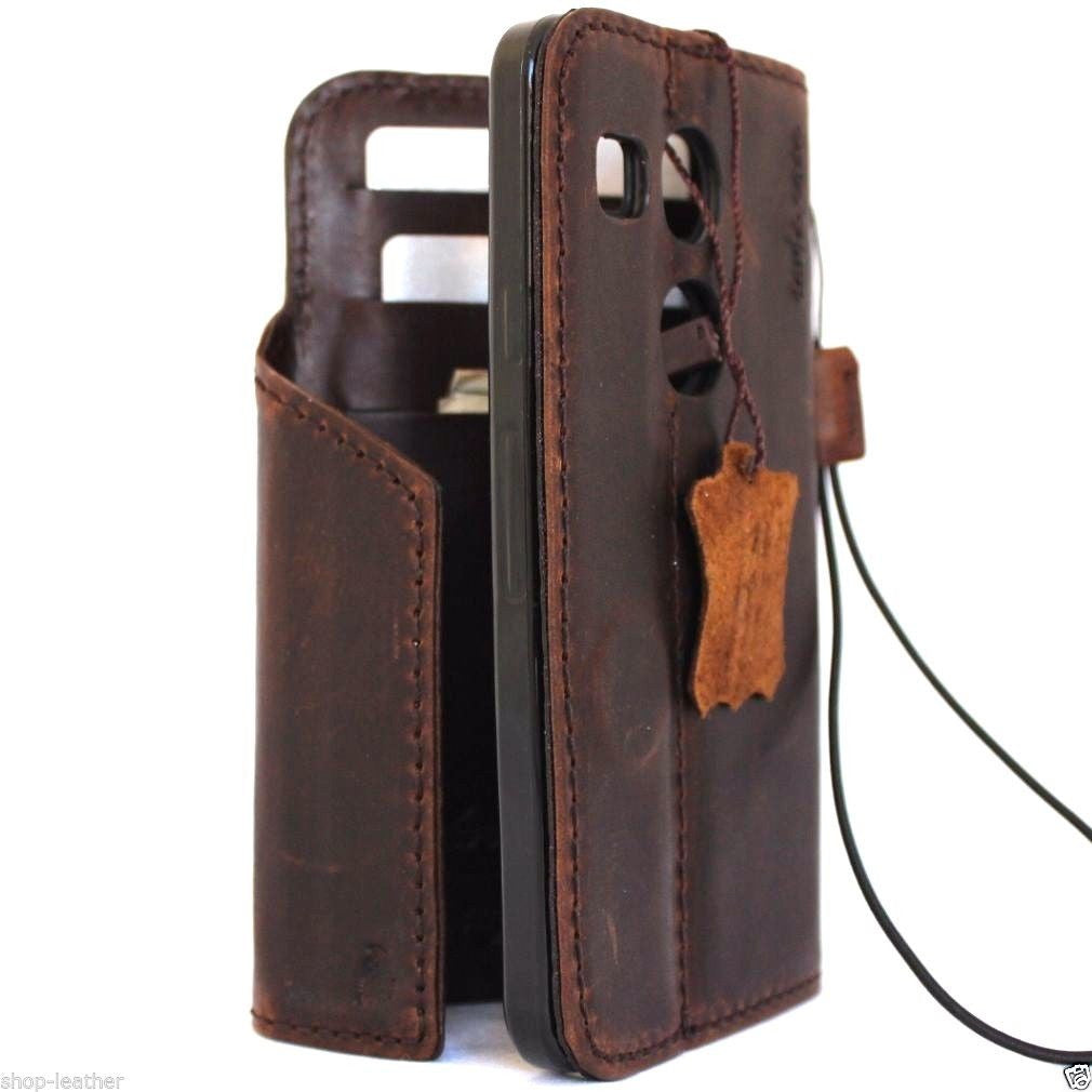 Dark brown genuine Italian leather wallet case for LG Nexus 5X with card slots, magnetic closure, slim handmade design.