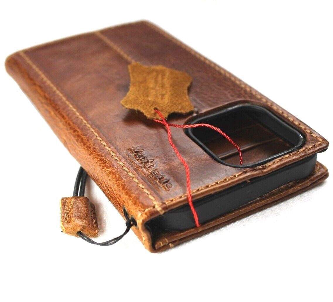 DavisCase genuine leather phone case for iPhone 11-15 Pro Max, handcrafted vintage tan wallet style with credit card slots and embossing.