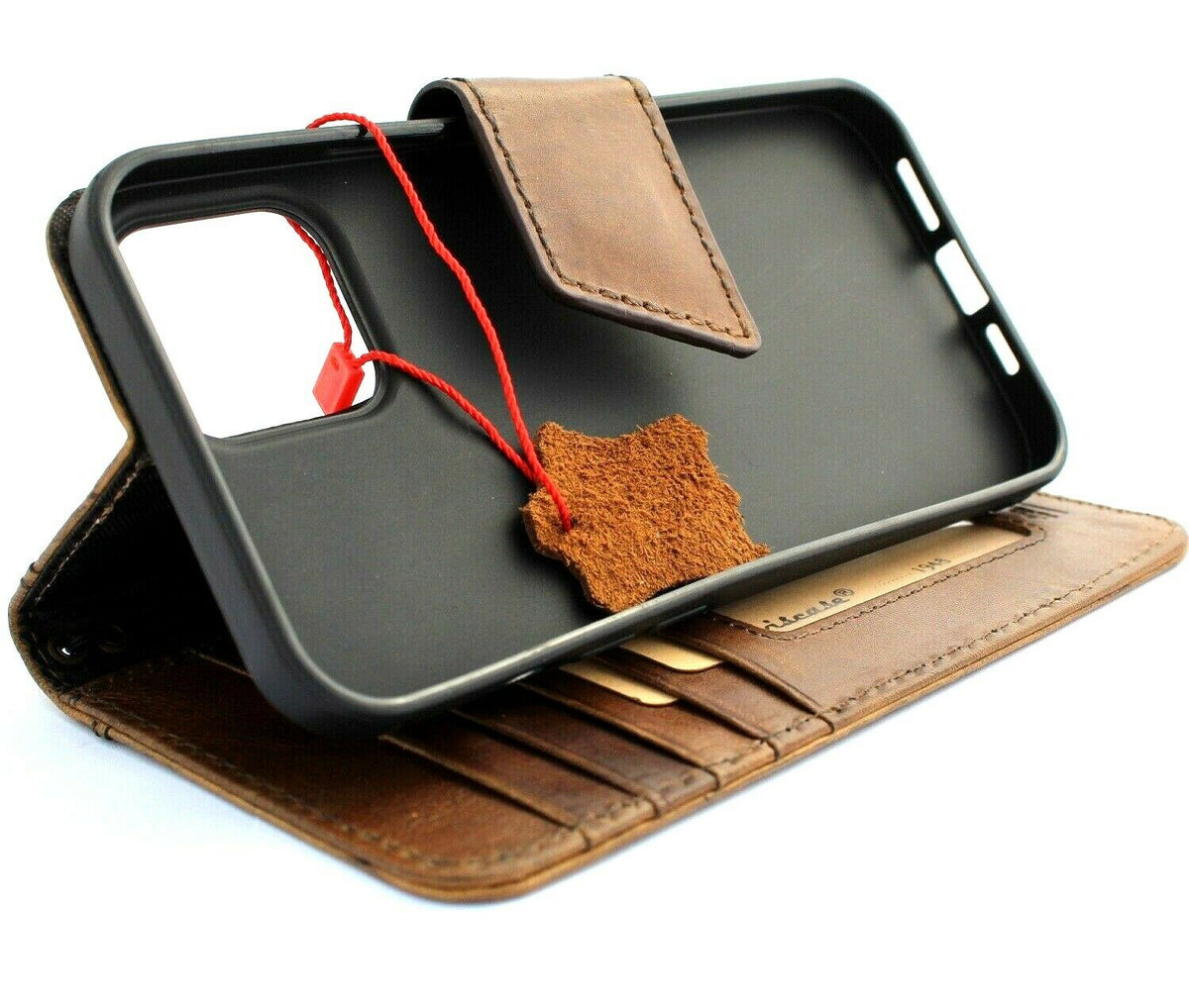 Handmade leather phone case for iPhone 15, 14 Pro Max, and more by DAVISCASE with vintage-style credit card slots and magnetic closure.