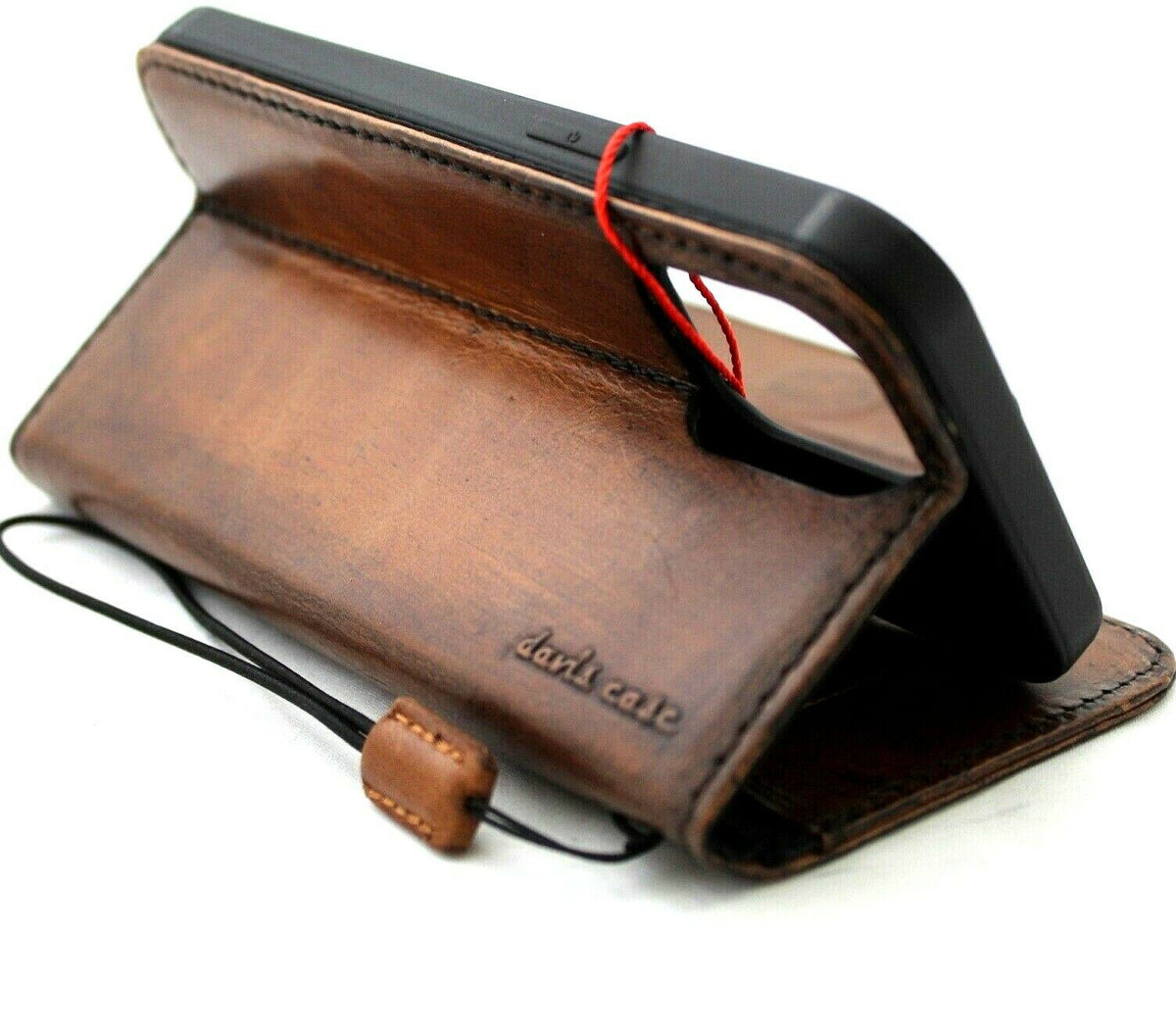 Vintage leather wallet case for Apple iPhone 12 Pro Max by DAVISCASE with credit card slots and magnetic closure.