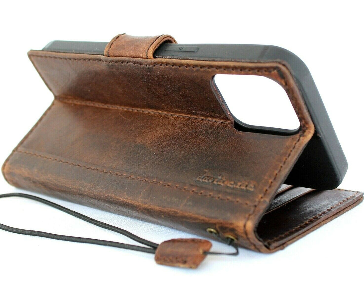 Handmade genuine leather phone case for Apple iPhone 15 Pro Max and Galaxy S26 Ultra, with magnetic closure and wallet features.