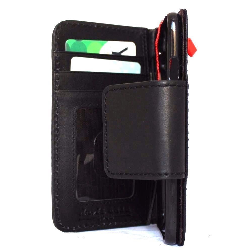 Black genuine leather iPhone 8 case with wallet card slots and magnetic closure, designed for wireless charging and classic Davis style.