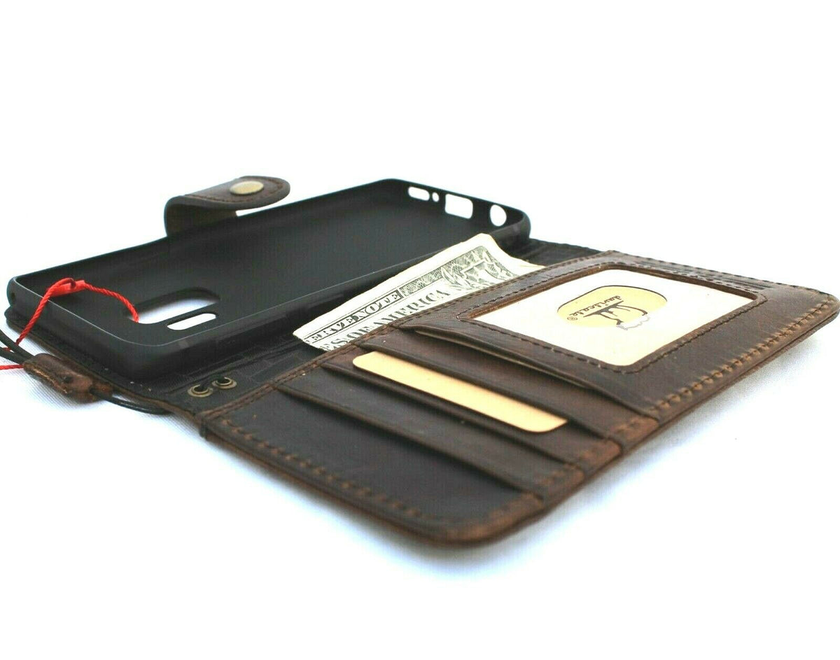 Dark genuine Italian leather case for Samsung Galaxy S9, handmade wallet-style phone cover with rubber holder, wireless charging compatible.