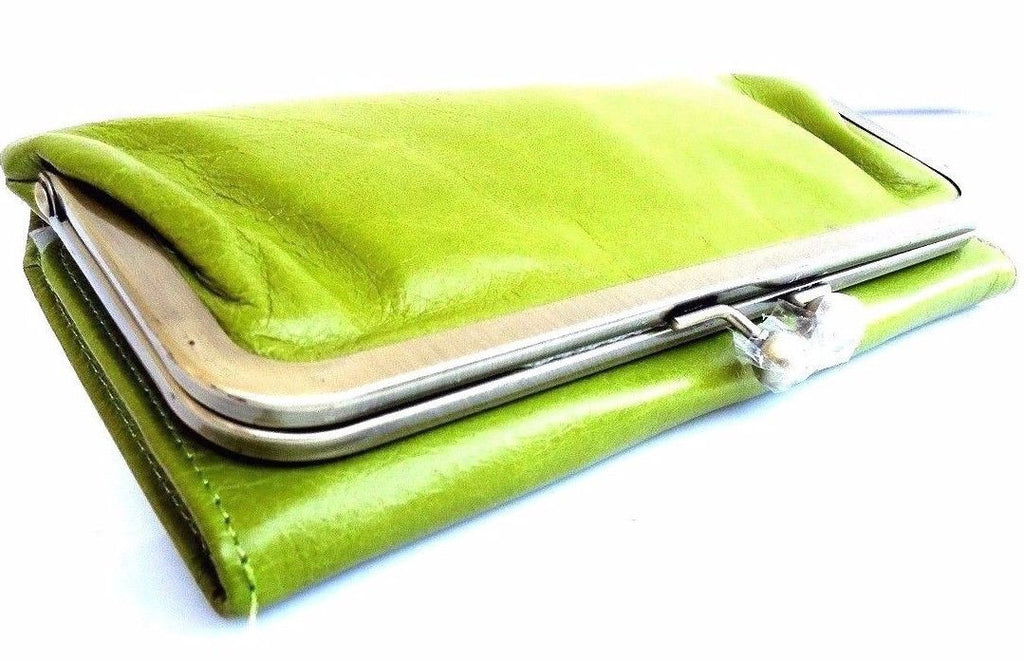 Green genuine leather women's wallet with card slots, coin pouch, and clutch design by DAVISCASE.