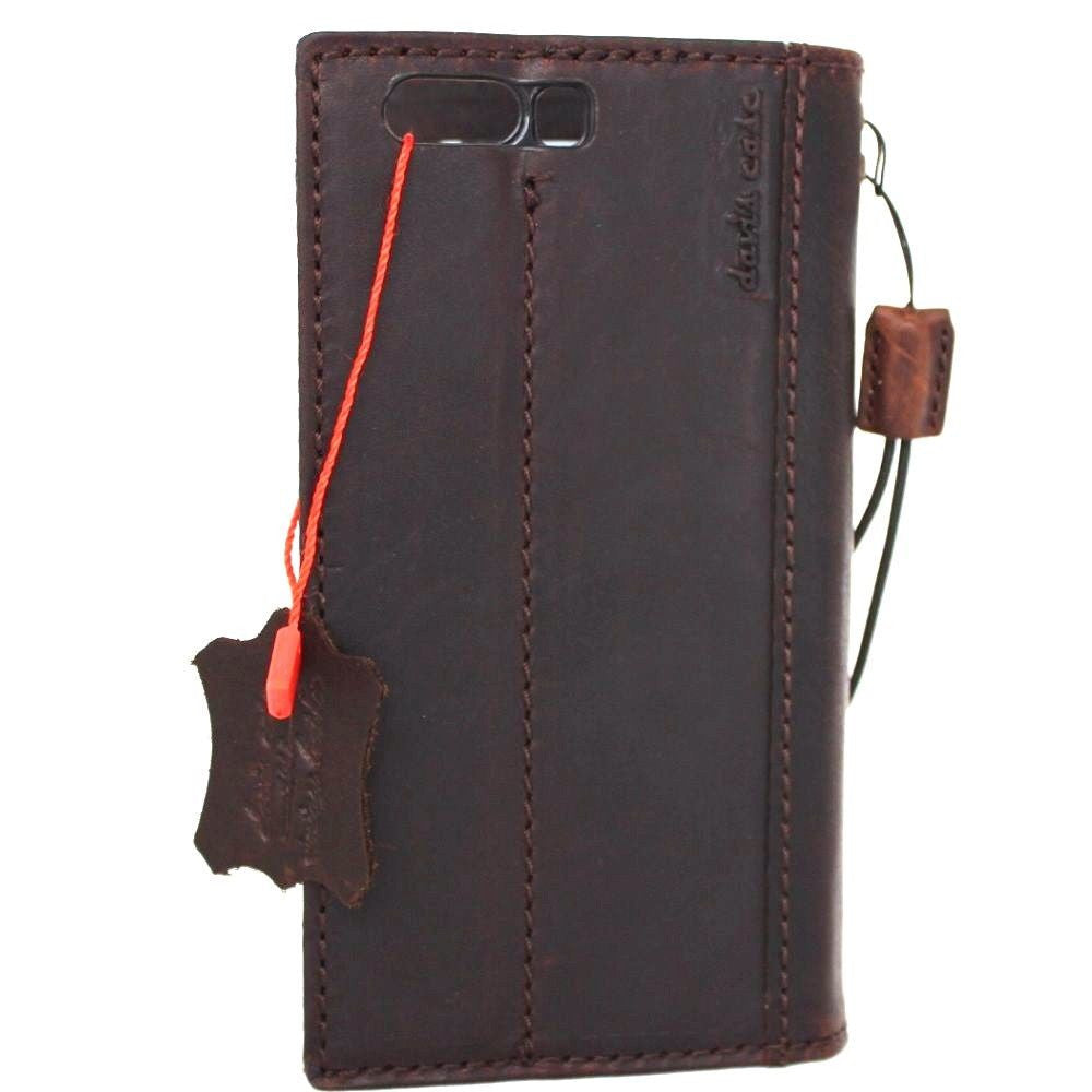 Handmade genuine leather phone case for Huawei P10, retro book wallet style by DAVISCASE with Galaxy branding.