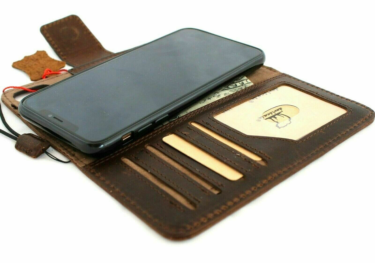 Genuine dark leather iPhone XS case by DAVISCASE with vintage wallet design, magnetic closure, credit holder, and wireless charging compatibility.