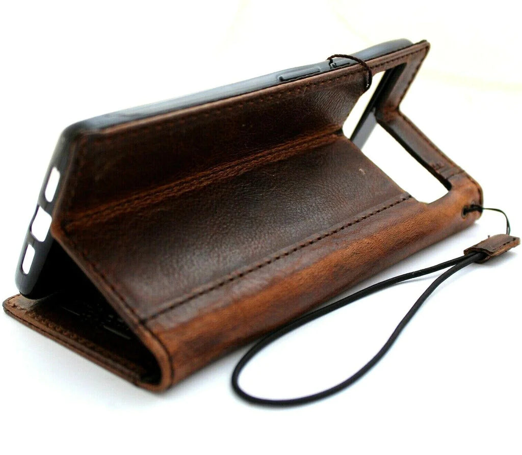 Genuine leather Google Pixel 7 Pro case by DAVISCASE with wallet design, stand feature, and wireless charging compatibility.
