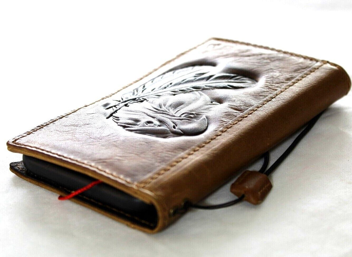 Handmade genuine leather phone case for iPhone 16, 12, 13, 14, 15 Pro Max by DAVISCASE in vintage tan with stamped eagle design.