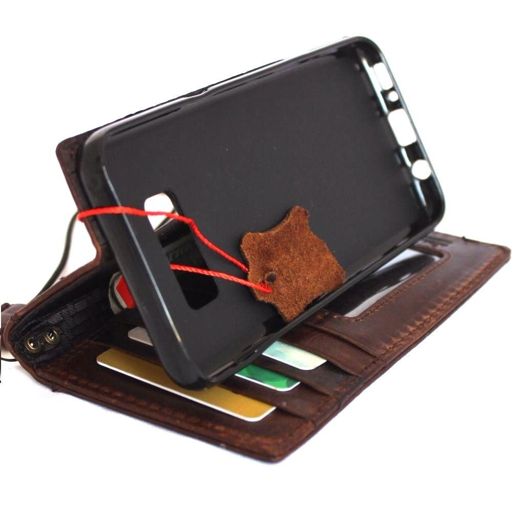 Handmade genuine Italian leather wallet case for Samsung Galaxy S8, featuring a classic book-style design and precise craftsmanship.