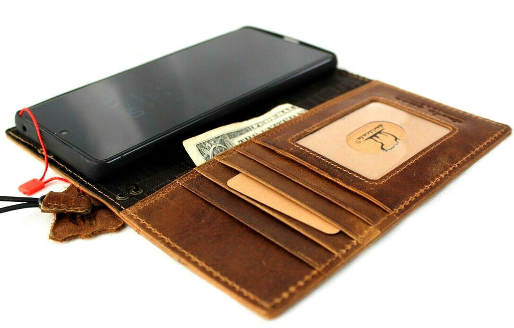 DavisCase genuine leather wallet case for Samsung Galaxy S21 Ultra with card slots, wireless charging holder, and luxury rubber accents.