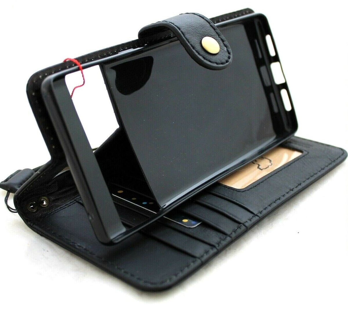 Black genuine leather Google Pixel 7 Pro case with book wallet closure, stand feature, wireless charging cutouts, by DAVISCASE.