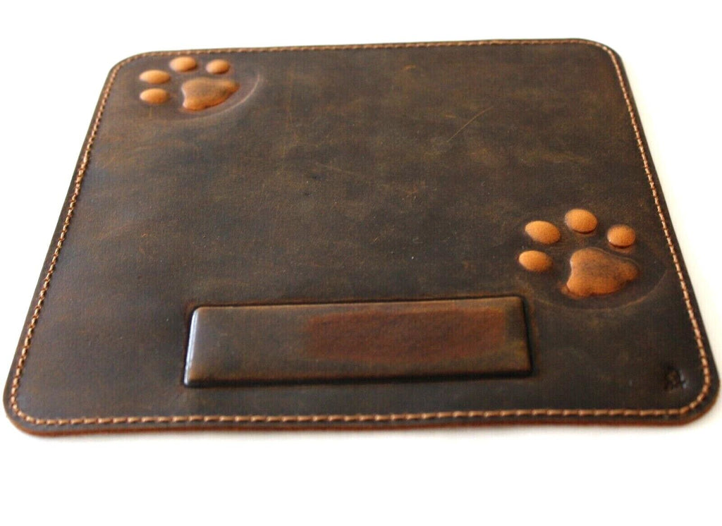 Genuine leather iPad case with vintage style and handcrafted dog paw and cat motifs, made by DAVISCASE.