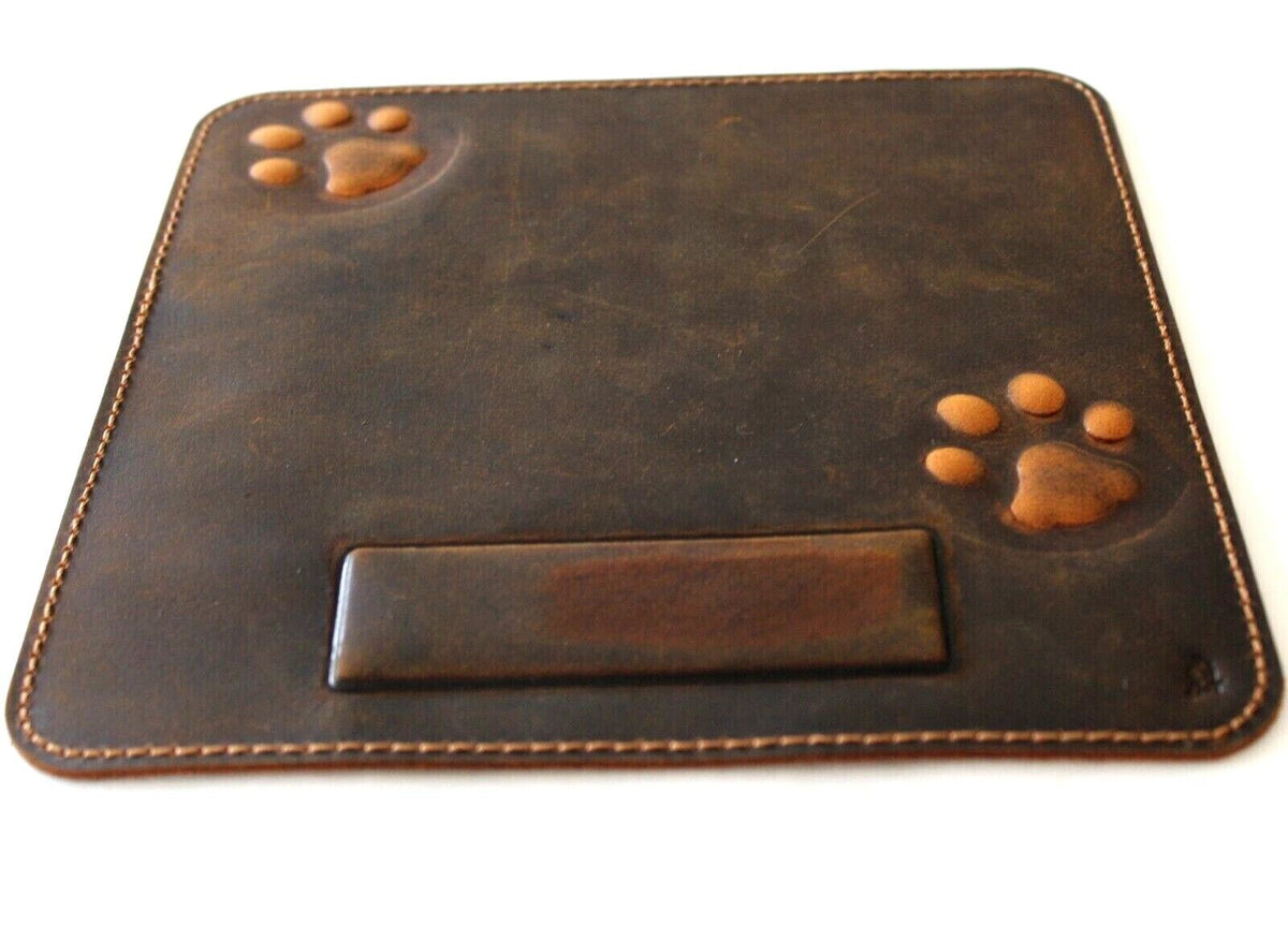 Genuine leather iPad case with vintage style and handcrafted dog paw and cat motifs, made by DAVISCASE.