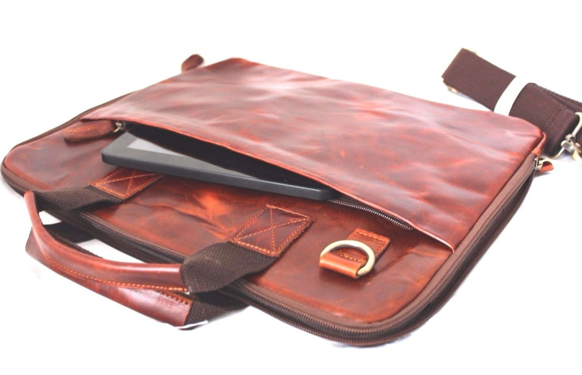 Brown genuine leather men's shoulder bag with crossbody strap, featuring a messenger style and business laptop compartment.