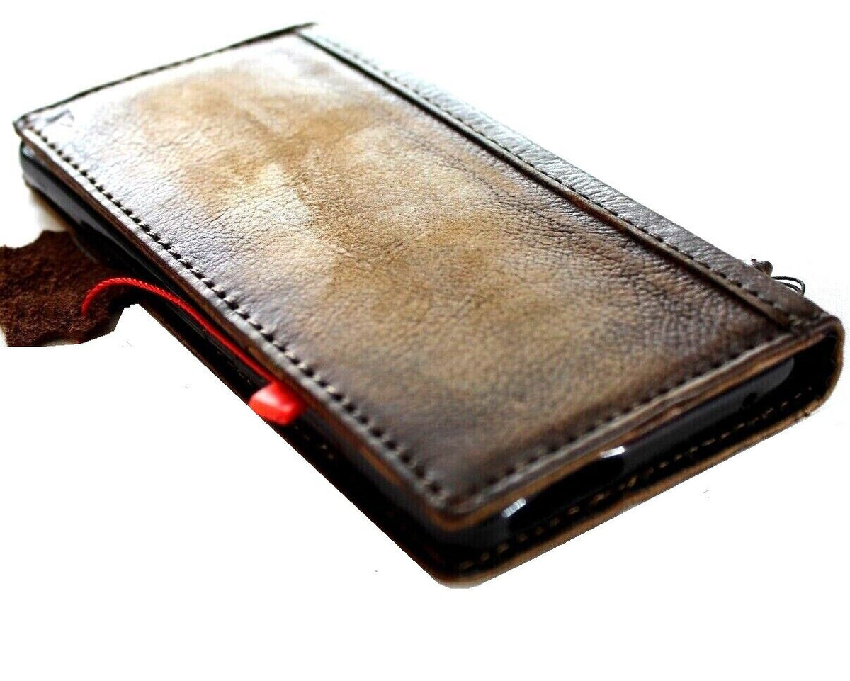 Genuine leather case for Google Pixel 7 Pro by DAVISCASE, featuring rustic fold book wallet design with stand and wireless charging support.
