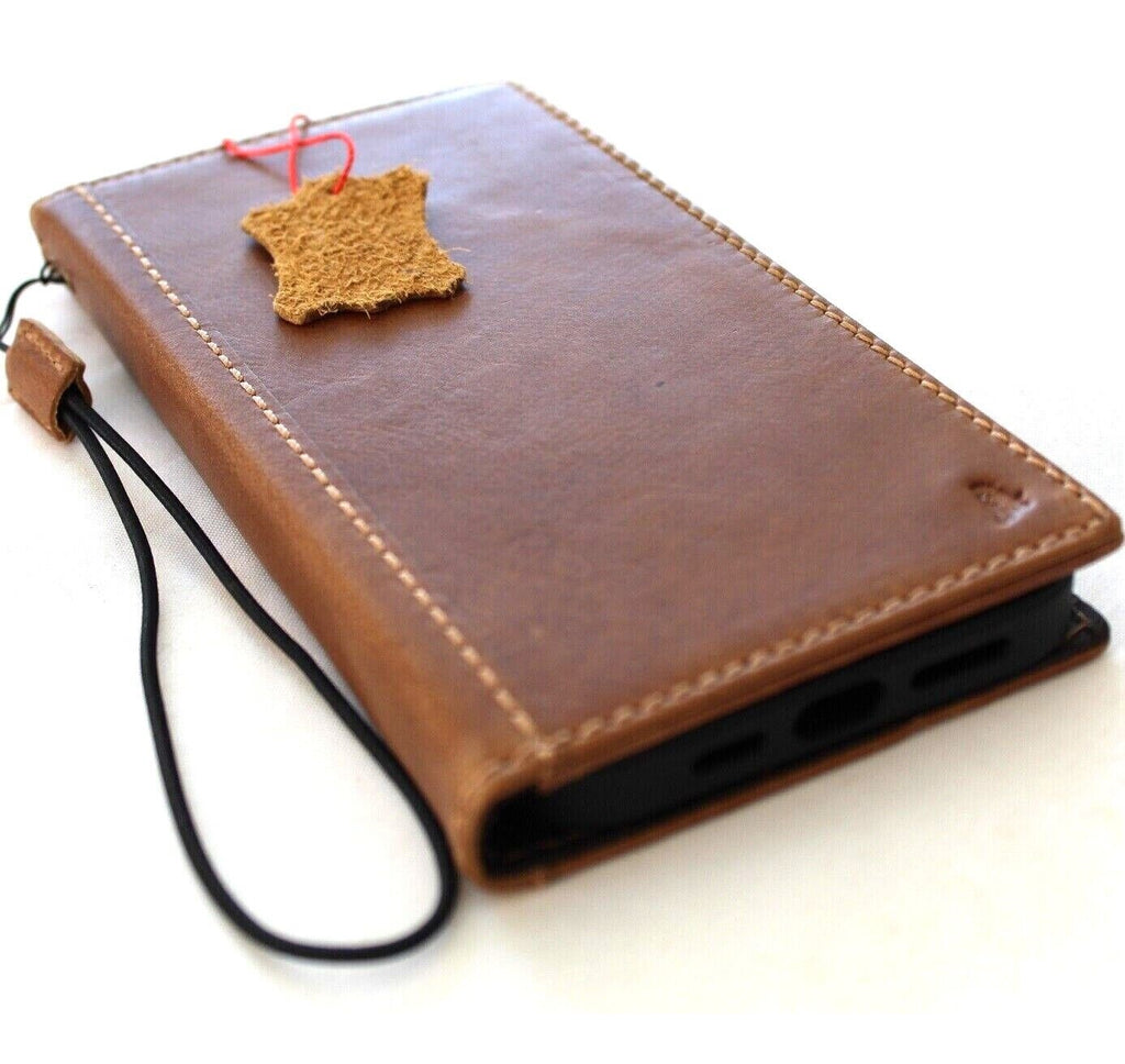 Handmade genuine leather phone case for iPhone 12-17 Pro Max, with card slots and luxury stamped design by DAVISCASE.