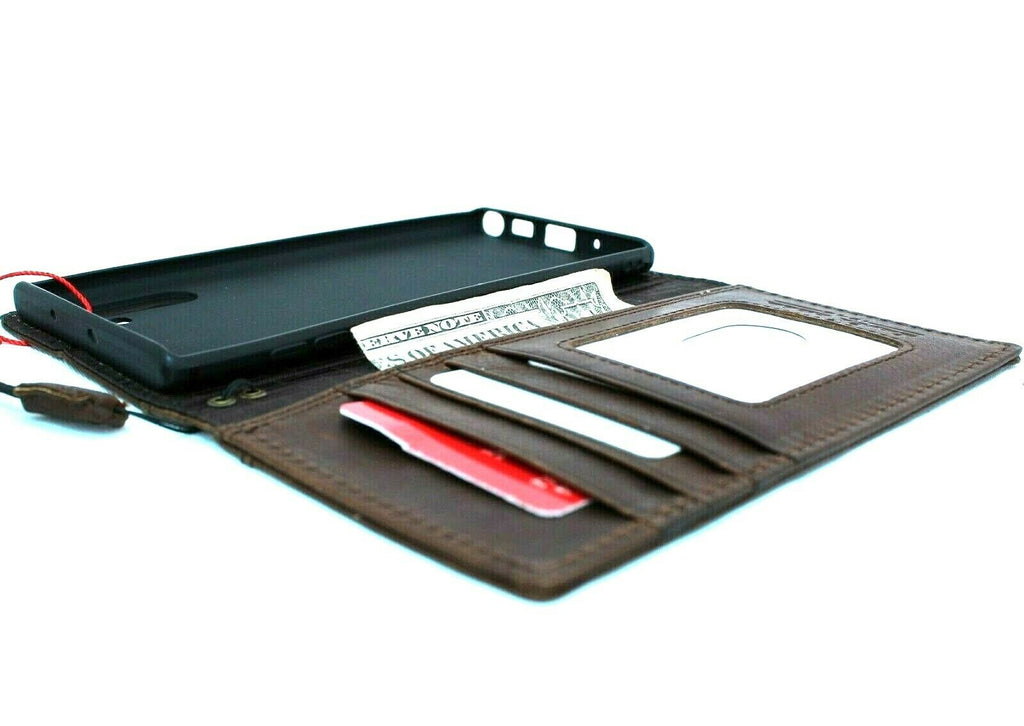 Genuine full leather Samsung Galaxy Note 10 book-style case with slots, rubber holder, stand, and window for viewing.