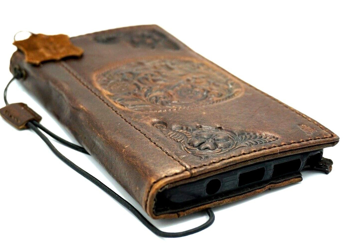 Handcrafted DAVISCASE genuine leather phone case for iPhone 11 to 15 Max, vintage tan style with credit card slots and embossed design.