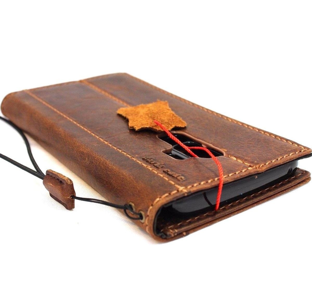 Genuine vintage tan leather Samsung Galaxy S9 Plus phone case with book wallet design, elastic strap, and card slots by DAVISCASE.