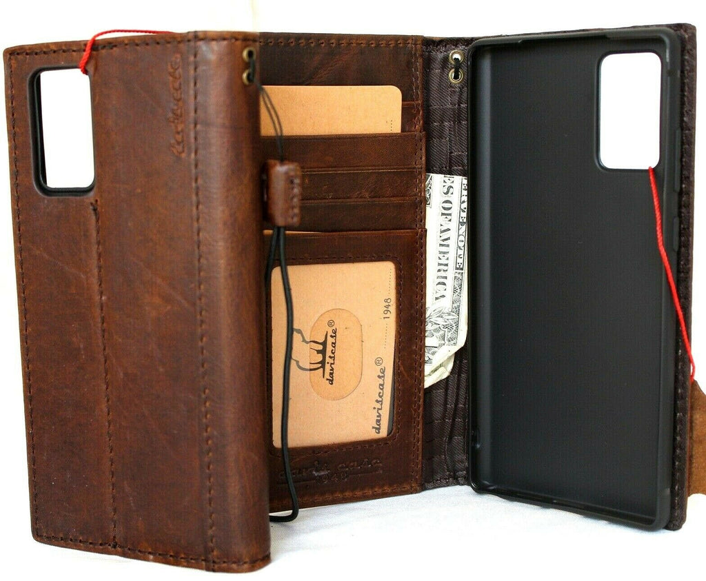 Genuine leather OnePlus 15 book wallet case by DAVISCASE with card slots, ID window, wireless charging holder, and premium finish.