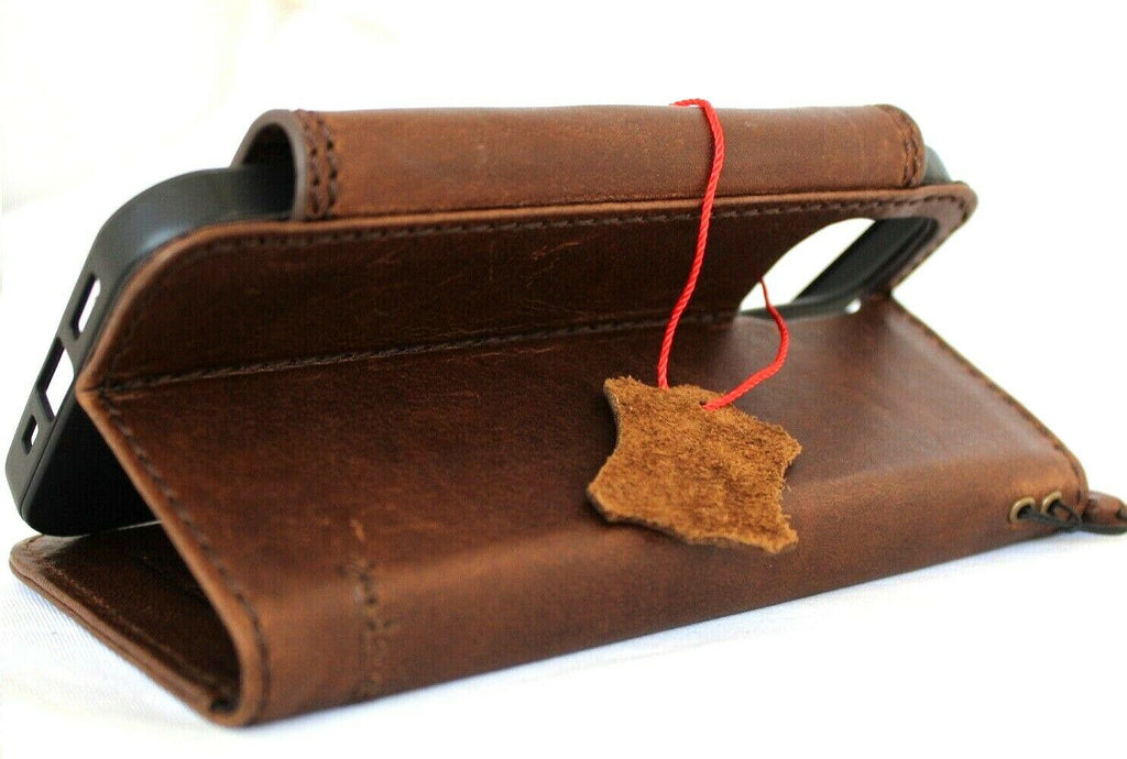 Vintage-style dark leather case for Apple iPhone 12 Pro, handmade DAVISCASE book wallet with credit card slots and soft closure.
