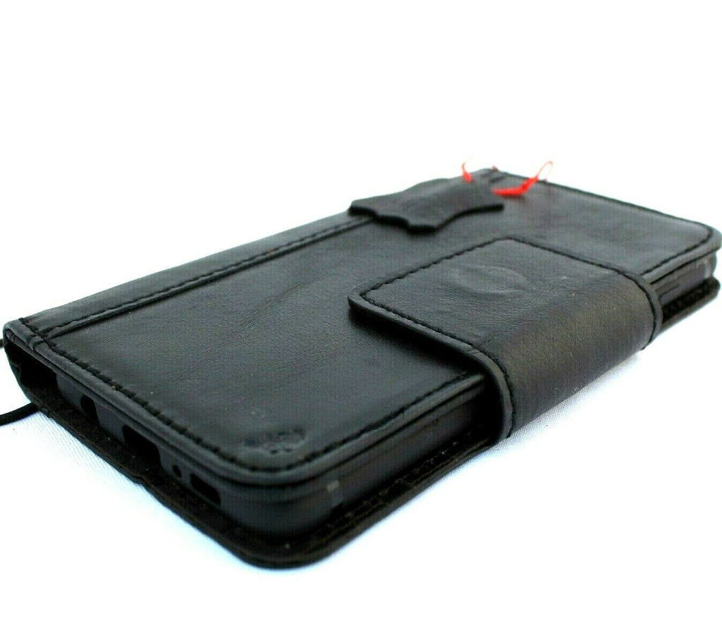 Black genuine leather Samsung Galaxy S10 book wallet case by DAVISCASE with card slots and magnetic closure.
