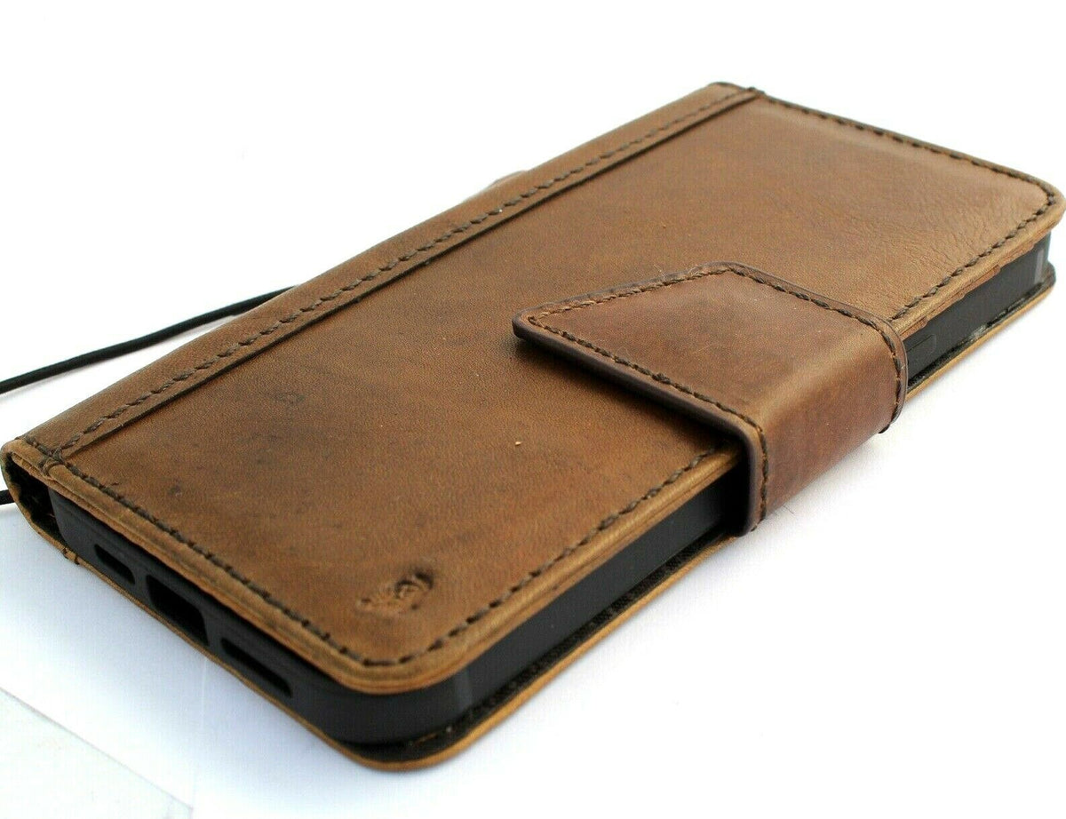 Handmade leather phone case for iPhone 15, 14 Pro Max, XS, SE 2, 8 Plus with vintage style, credit card slots, and magnetic closure.