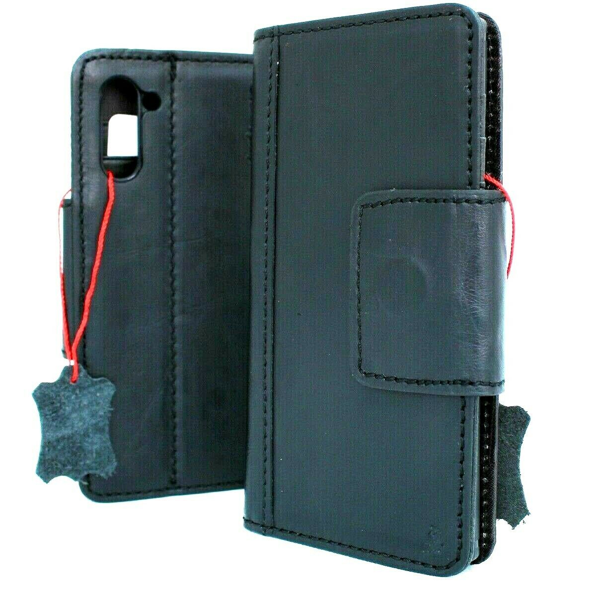 Black genuine leather Samsung Galaxy Note 10 book wallet case with magnetic strap, window opening, and wireless charging capability.