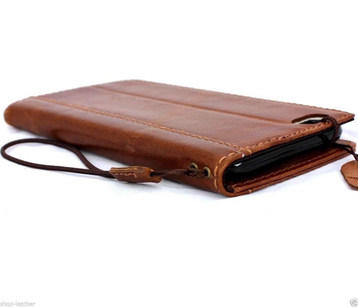Handmade genuine Italian leather case for iPhone 6 Plus with flip cover, card slots, and slim design in brown leather.