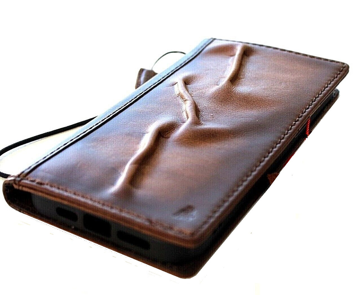 Handcrafted genuine leather phone case for iPhone and Samsung, vintage style with card slots and full grain leather finish.