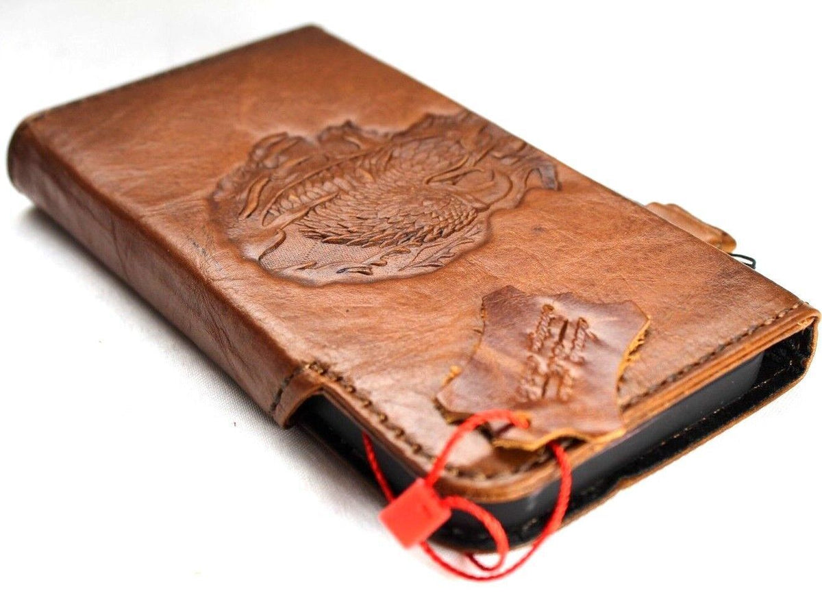 Google Pixel 7 Pro genuine leather wallet case by DAVISCASE with eagle stamping, 3D design, wireless charging compatible.