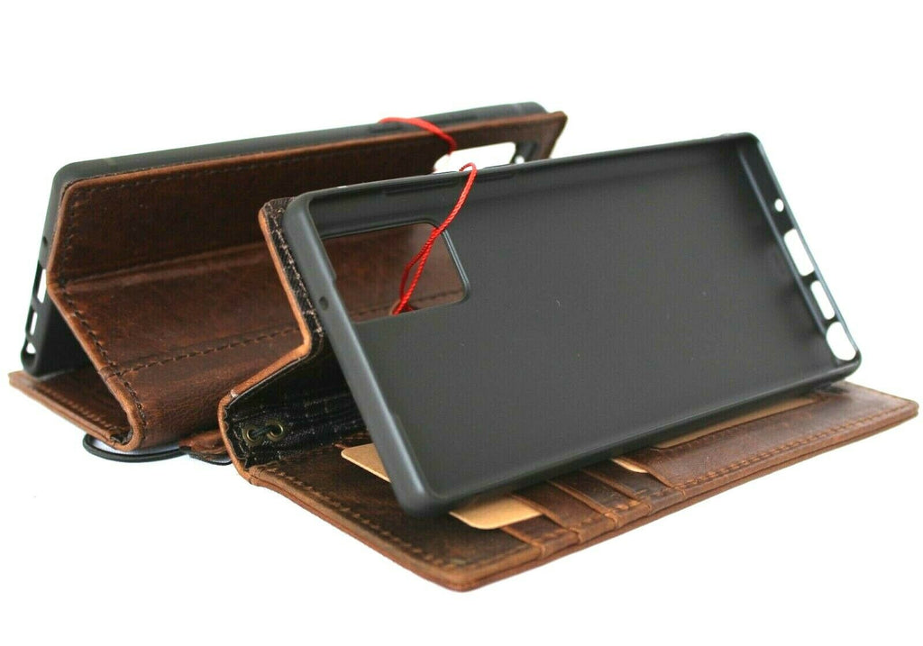 DAVISCASE genuine leather OnePlus 15 book wallet case with card slots, wireless charging holder, and ID window.