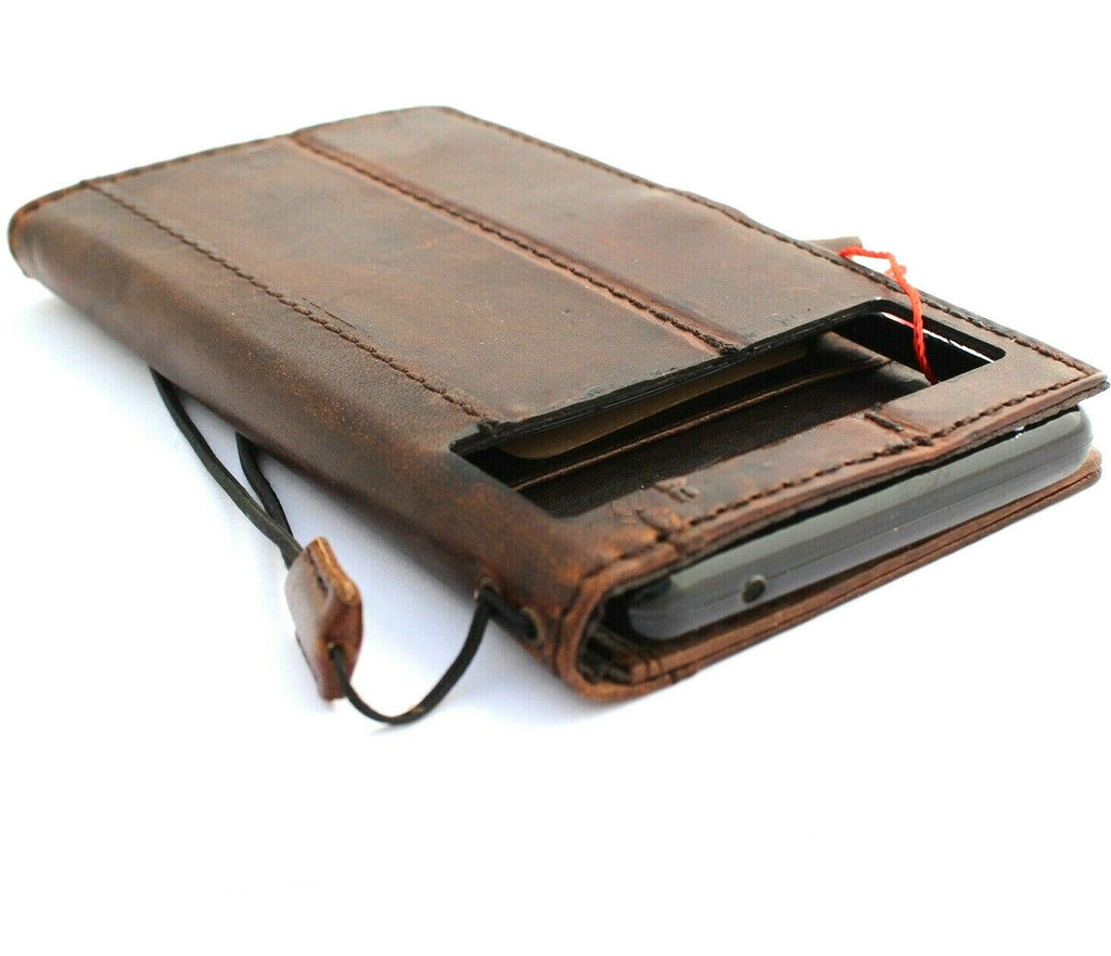 Genuine leather Google Pixel 7 Pro case by DAVISCASE with wallet design, magnetic closure, stand feature, and wireless charging compatibility.