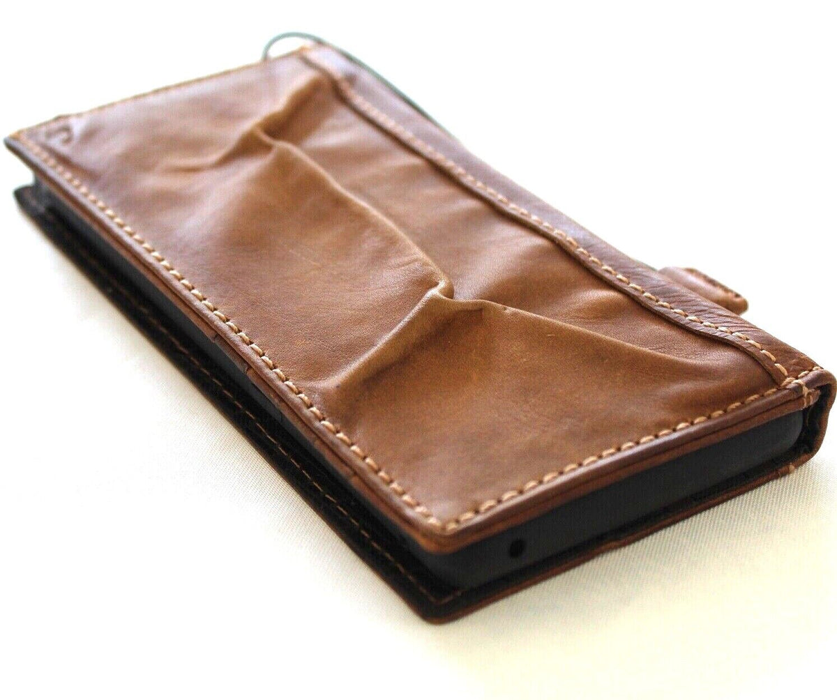 DavisCase vintage-style genuine leather phone case for iPhone 11-16 Pro Max with credit card slots and wallet features.