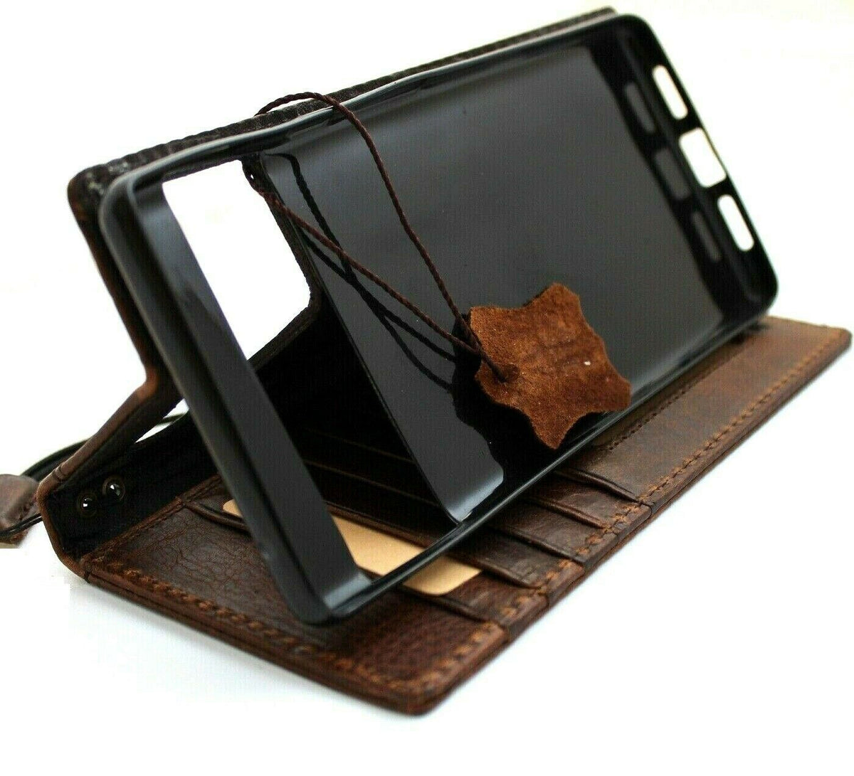 Genuine leather Google Pixel 7 Pro case by DAVISCASE with retro fold book design, wireless charging compatible, dark leather finish.