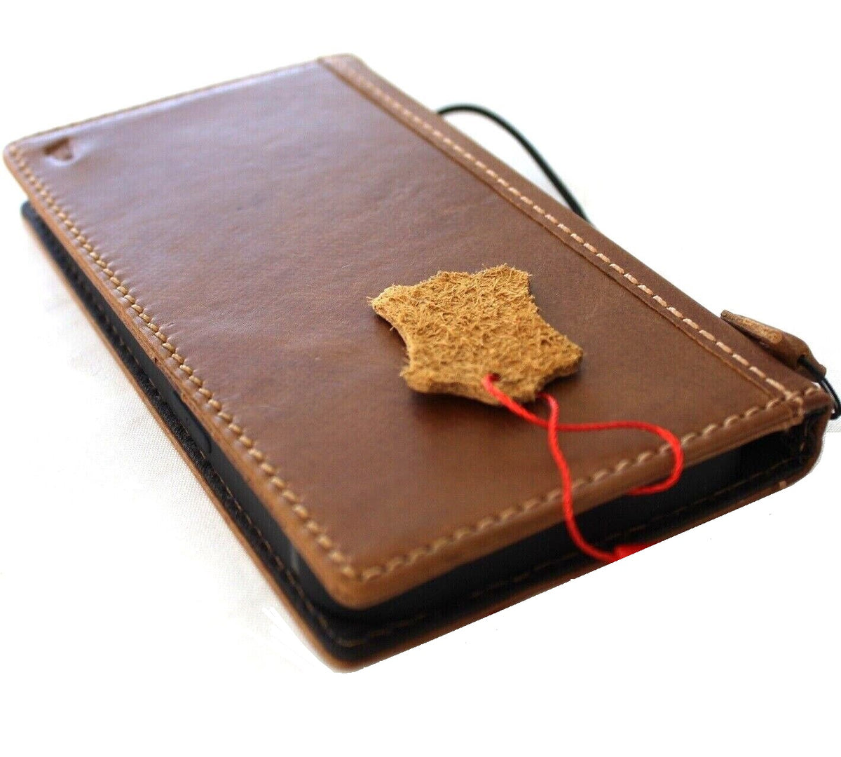 Handmade genuine leather phone case for iPhone 17, 16, 12, 13, 14, 15 Pro Max, featuring card slots and luxury stamping.
