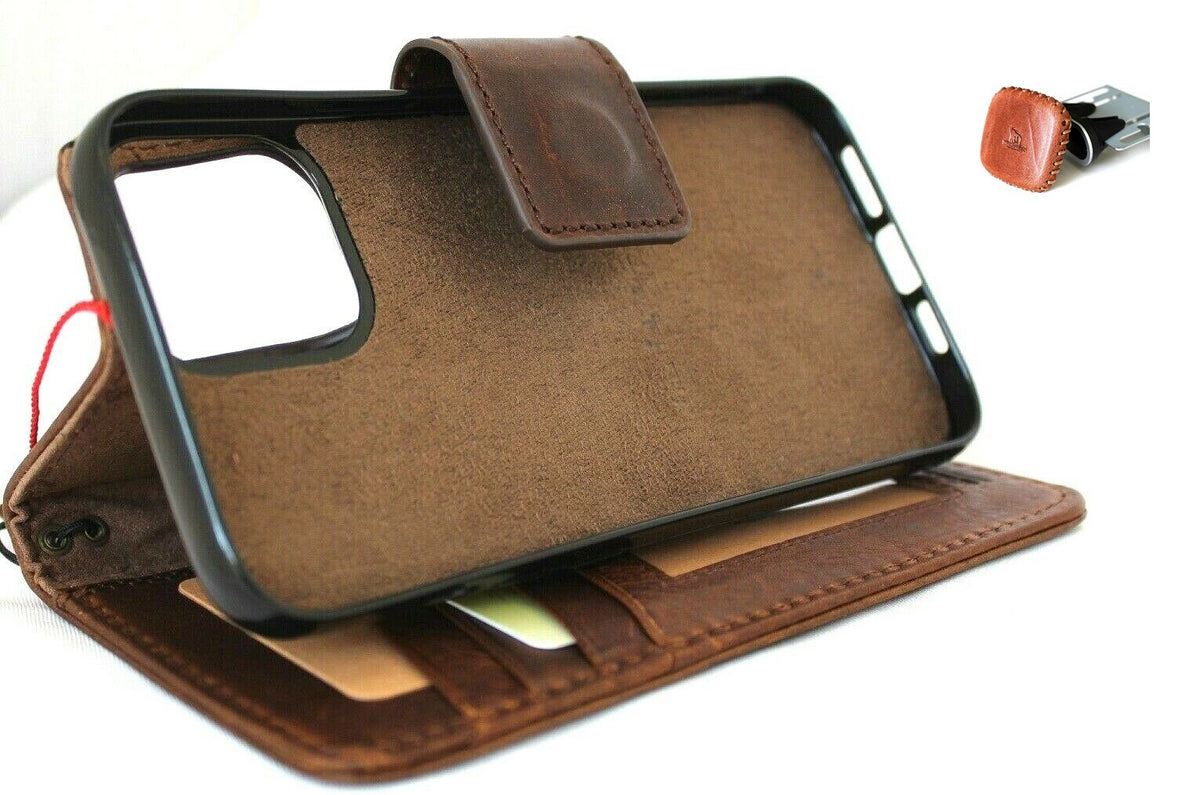 Genuine dark leather iPhone 12 Pro Max case with wallet design, ID window, credit card slots, magnetic cover, and car holder by DAVISCASE.