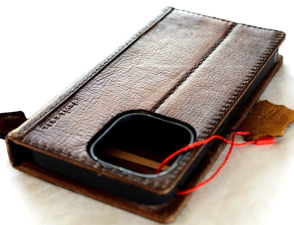 Handmade vintage leather phone case for Apple iPhone 12-16 Pro Max, SE, and 8 Plus by DAVISCASE, with Bible craft design.