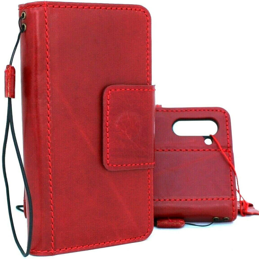 Red genuine leather flip cover case for Samsung Galaxy Note 10 with magnetic clasp and wireless charging compatibility.