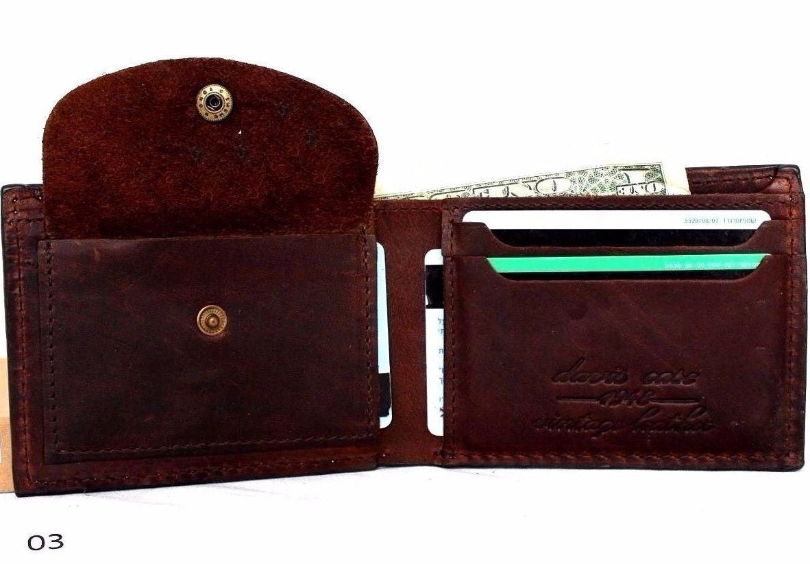Men's brown leather wallet with four credit card slots and one bill compartment, slim bifold design, made of natural leather.