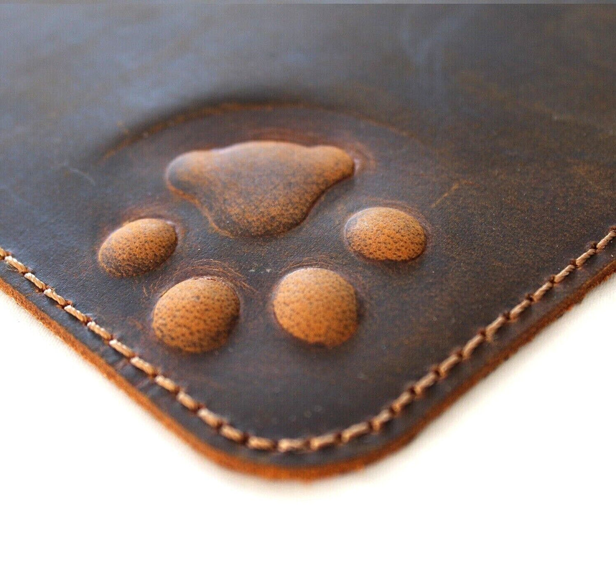 Genuine leather iPad case with vintage, handcrafted dog paw and cat design, by DAVISCASE, featuring soft retro style and handmade craftsmanship.