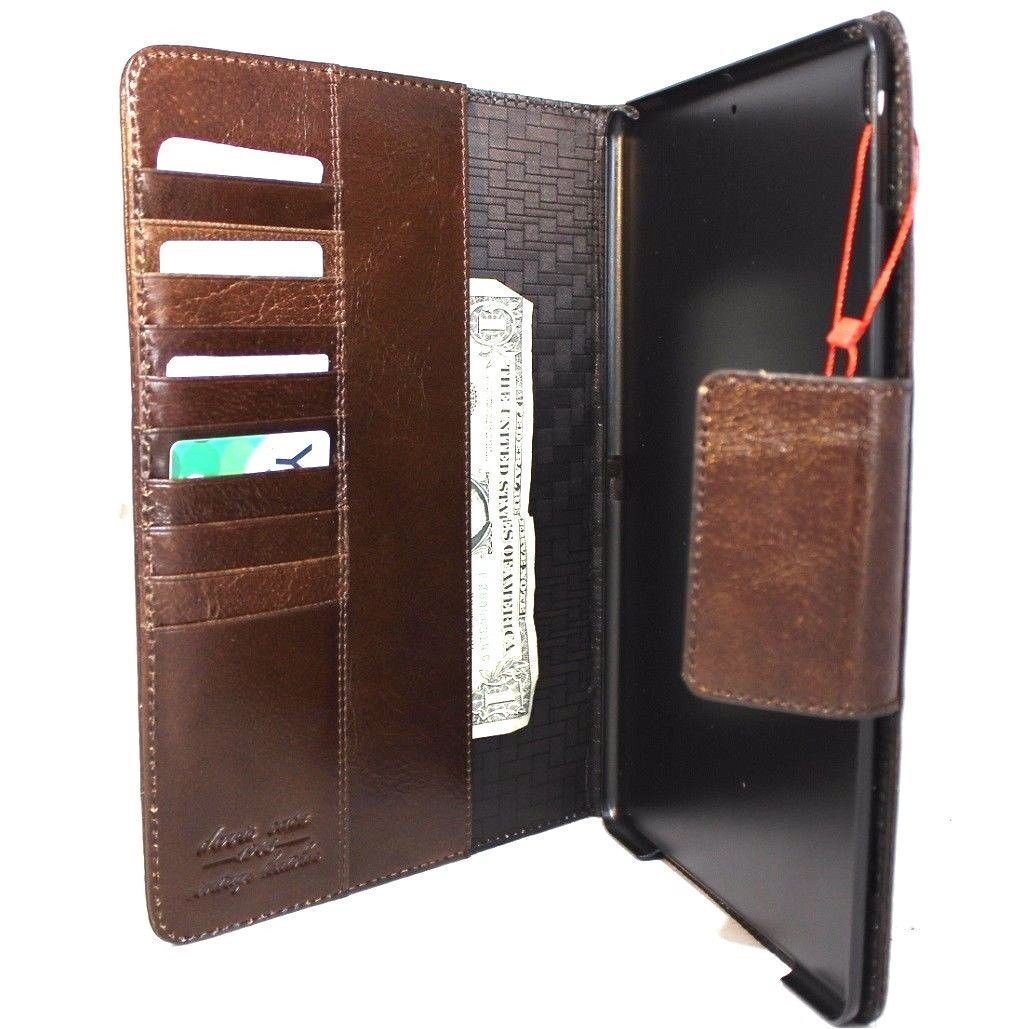 Brown genuine vintage leather iPad Pro 10.5 case by DAVISCASE with stand, credit card slots, slim design, and handcrafted details.