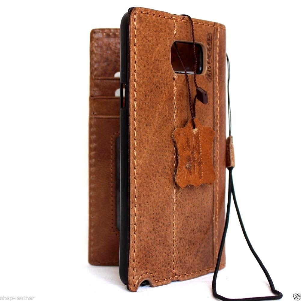 Genuine full leather Samsung Galaxy Note 5 book wallet case with slim, handmade design and luxury cover in black leather.