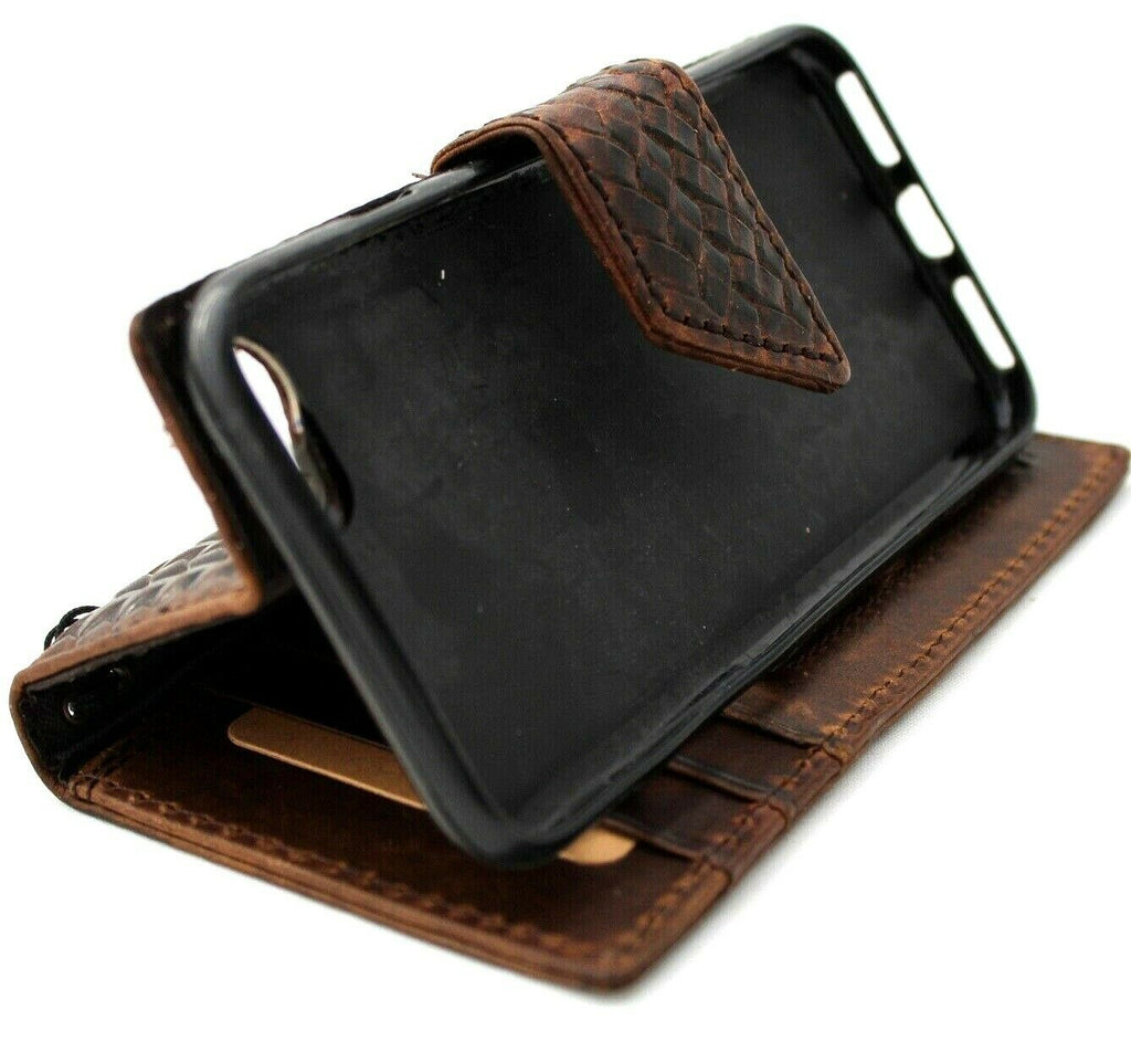 Genuine dark leather iPhone 8 magnetic case with wallet-style design, credit card holder, and luxurious handmade craftsmanship.