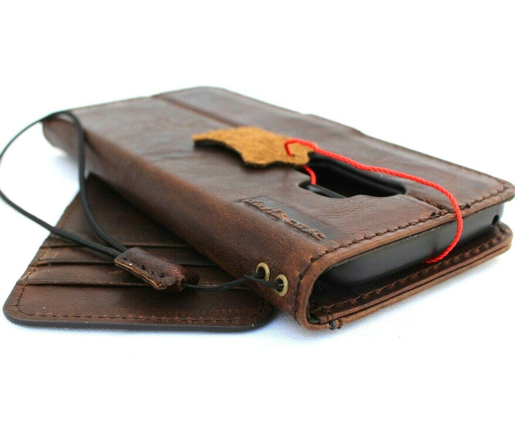 Handmade genuine Italian leather case for Samsung Galaxy S9 with book-style wallet design and rubber holder, dark color.