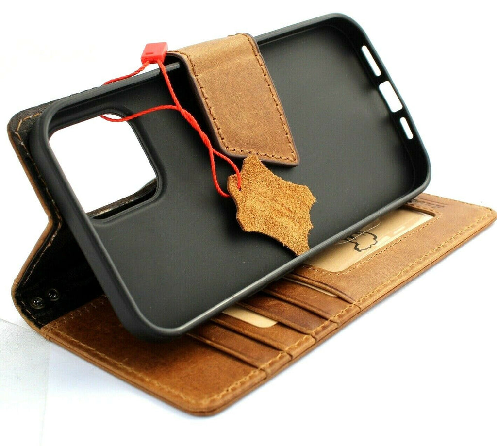DavisCase genuine leather phone case for iPhone models with vintage-style wallet design, credit card slots, and magnetic closure.