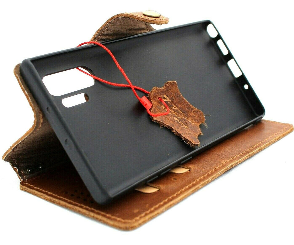 Vintage tan leather Samsung Galaxy Note 10 Plus case with card slots, rubber stand, slim design, and wireless charging compatibility.